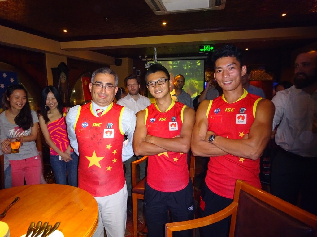 Consul General Trindade proudly wears his jumper signed by the Team China Power Dragons - presented by Zhang Hao and Chen Shaoliang